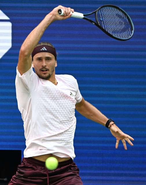(260914) -- NEW YORK, Sept. 14, 2026 (Xinhua) -- Alexander Zverev hits a return during the men's singles final match between Alexander Zverev of Germany and Ben Shelton of the United States at the 2026 US Open tennis championships in New York, the United States, Sept. 13, 2026. (Xinhua/Li Rui)