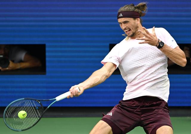 (260914) -- NEW YORK, Sept. 14, 2026 (Xinhua) -- Alexander Zverev hits a return during the men's singles final match between Alexander Zverev of Germany and Ben Shelton of the United States at the 2026 US Open tennis championships in New York, the United States, Sept. 13, 2026. (Xinhua/Li Rui)