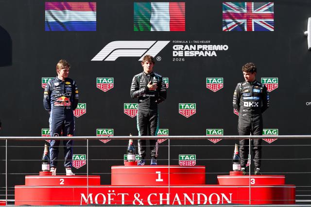 (260914) -- MADRID, Sept. 14, 2026 (Xinhua) -- Winner Mercedes' Kimi Antonelli of Italy (C),  2nd Place Red Bull's Max Verstappen of the Netherlands (L), 3rd Place McLaren's Lando Norris of Britain stand on the podium after the Formula 1 Spanish Grand Prix Race at Madring Circuit, Madrid, Spain, Sept. 13, 2026. (Photo by Qian Jun/Xinhua)