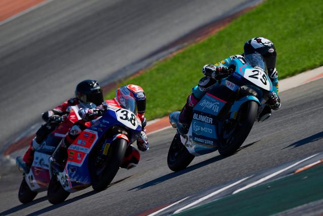 (260914) -- VALENCIA, Sept. 14, 2026 (Xinhua) -- CFMOTO Aspar's Sun Shengbo (R) of China competes during the Race 2 of the ESBK Talent category at the 2026 Spanish Superbike Championship Valencia in Valencia, Spain, Sept. 13, 2026. (Photo by Pablo Morano/Xinhua)