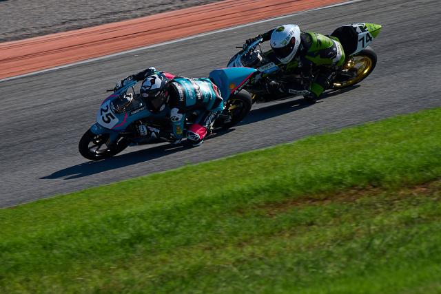 (260914) -- VALENCIA, Sept. 14, 2026 (Xinhua) -- CFMOTO Aspar's Sun Shengbo (L) of China competes during the Race 2 of the ESBK Talent category at the 2026 Spanish Superbike Championship Valencia in Valencia, Spain, Sept. 13, 2026. (Photo by Pablo Morano/Xinhua)