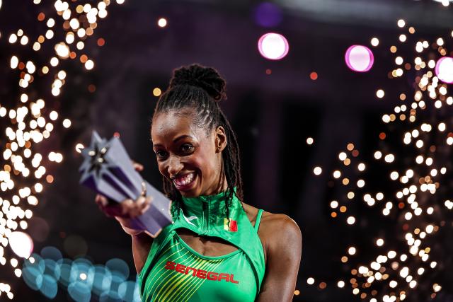 (260914) -- BUDAPEST, Sept. 14, 2026 (Xinhua) -- Saly Sarr of Senegal reacts during the awarding ceremony of the women's triple jump competition at the World Athletics Ultimate Championship in Budapest, Hungary, Sept. 13, 2026. (Photo by David Balogh/Xinhua)