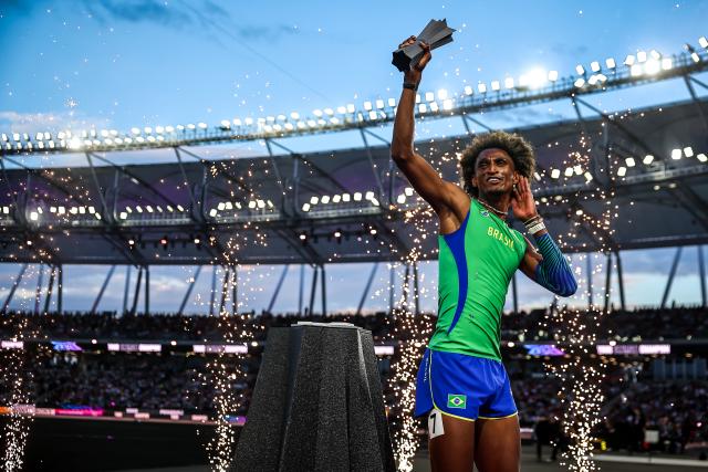 (260914) -- BUDAPEST, Sept. 14, 2026 (Xinhua) -- Alison Dos Santos of Brazil reacts during the awarding ceremony of the men's 400m hurdles race at the World Athletics Ultimate Championship in Budapest, Hungary, Sept. 13, 2026. (Photo by David Balogh/Xinhua)