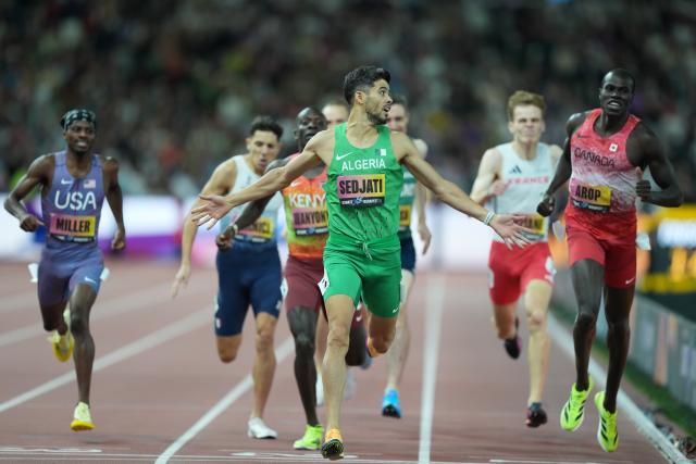 (260914) -- BUDAPEST, Sept. 14, 2026 (Xinhua) -- Djamel Sedjati (front) of Algeria reacts after crossing the finish line during the men's 800m race at the World Athletics Ultimate Championship in Budapest, Hungary, Sept. 13, 2026. (Photo by Attila Volgyi/Xinhua)