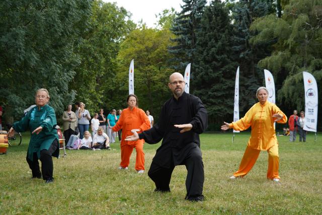 (260914) -- BUDAPEST, Sept. 14, 2026 (Xinhua) -- People perform Taiji during the 6th Family and Friends Gathering of the Hungarian Chan Wu Federation on Margaret Island in Budapest, Hungary, Sept. 13, 2026. (Xinhua/Chen Hao)