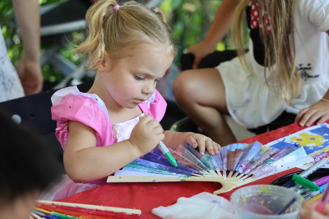 (260914) -- LOS ANGELES, Sept. 14, 2026 (Xinhua) -- A child attends a hands-on art activity during a culture event to celebrate the Mid-Autumn Festival at the Bowers Museum in Santa Ana, California, on Sept. 13, 2026. The Bowers Museum in Southern California hosted a series of cultural events on Sunday to celebrate the Mid-Autumn Festival, one of the most cherished traditional holidays in China and other parts of Asia.
  The events featured traditional Chinese music and dance performances, a Chinese fashion show, tea ceremonies, Kung Fu demonstration and face-changing performance, along with hands-on cultural activities including Chinese paper-cutting and traditional printing.
  The events also included screening of documentaries on Chinese giant pandas and white dolphins.
   Visitors enjoyed traditional mooncakes, face painting and free art projects, and had the opportunity to experience traditional Chinese attire through a photo activity. (Photo by Zeng Hui/Xinhua)
