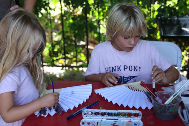(260914) -- LOS ANGELES, Sept. 14, 2026 (Xinhua) -- Children attend a hands-on art activity during a culture event to celebrate the Mid-Autumn Festival at the Bowers Museum in Santa Ana, California, on Sept. 13, 2026. The Bowers Museum in Southern California hosted a series of cultural events on Sunday to celebrate the Mid-Autumn Festival, one of the most cherished traditional holidays in China and other parts of Asia.
  The events featured traditional Chinese music and dance performances, a Chinese fashion show, tea ceremonies, Kung Fu demonstration and face-changing performance, along with hands-on cultural activities including Chinese paper-cutting and traditional printing.
  The events also included screening of documentaries on Chinese giant pandas and white dolphins.
   Visitors enjoyed traditional mooncakes, face painting and free art projects, and had the opportunity to experience traditional Chinese attire through a photo activity. (Photo by Zeng Hui/Xinhua)