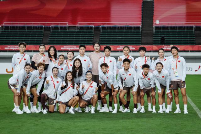 (260914) -- GIFU, Sept. 14, 2026 (Xinhua) -- Team China gather for a group photo before the group G match of Women's Football between China and China's Hong Kong at 20th Asian Games Aichi-Nagoya 2026 in Gifu, Japan, Sept. 14, 2026. (Xinhua/Jia Haocheng)