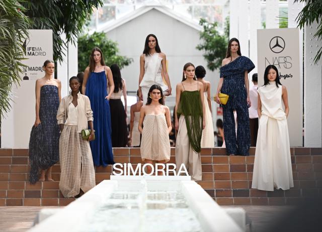 (260914) -- MADRID, Sept. 14, 2026 (Xinhua) -- Models present creations by Simorra during the Madrid Fashion Week in Madrid, Spain, Sept. 14, 2026. (Xinhua/Cheng Min)