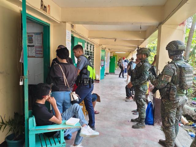 (260915) -- MANILA, Sept. 15, 2026 (Xinhua) -- Soldiers and policemen are seen at a polling center during the parliamentary election in the Bangsamoro Autonomous Region in Muslim Mindanao (BARMM), the Philippines, Sept. 14, 2026. The first parliamentary election in the BARMM began on Monday.
   According to local media reports, over 2 million voters are eligible to vote for 80 parliamentary seats being contested by 13 parties. Security has been stepped up across the BARMM in recent days, with over 20,000 security personnel deployed to polling areas and rapid response teams set up to deal with potential violence. (Armed Forces of the Philippines/Handout via Xinhua)