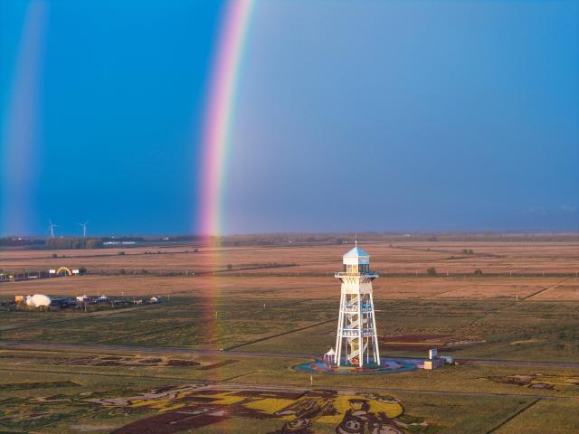 (260915) -- HARBIN, Sept. 15, 2026 (Xinhua) -- A drone photo taken on Sept. 13, 2026 shows a rainbow over paddy fields in Fujin City, northeast China's Heilongjiang Province. Heilongjiang is embracing the ripening season of paddy rice. (Photo by Qu Yubao/Xinhua)