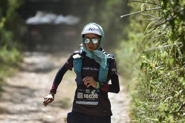 (260915) -- JAKARTA, Sept. 15, 2026 (Xinhua) -- A runner competes at the Bandung Ultra 100 in Bandung, West Java Province, Indonesia, Aug. 29, 2026. TO GO WITH "Feature: Indonesia's trail running boom takes runners from roads to mountains" (Xinhua/Veri Sanovri)