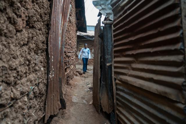 (260915) -- NAIROBI, Sept. 15, 2026 (Xinhua) -- Miriam Achieng Kenyatta walks to campus at Kibera informal settlement in Nairobi, Kenya, Sept. 8, 2026. Miriam Achieng Kenyatta, a 23-year-old geospatial engineering student at the University of Nairobi, received a warm reception upon returning home after making history at the 25th "Chinese Bridge" Chinese Proficiency Competition for Foreign College Students.
  Raised in Nairobi's Kibera informal settlement, Achieng's life trajectory was transformed by a childhood curiosity sparked by a television movie. Her passion culminated in the highest-ever ranking by a Kenyan in the prestigious global contest, where she placed among the Top 15 worldwide.
  TO GO WITH "From Kibera to world top 15: Kenyan student makes history in Chinese competition" (Xinhua/Xie Jianfei)