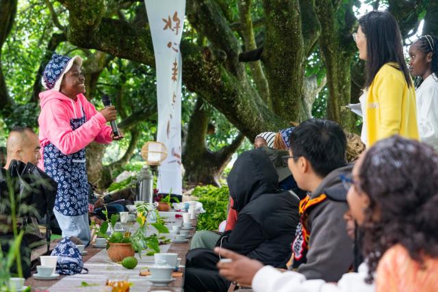 (260915) -- NAIROBI, Sept. 15, 2026 (Xinhua) -- Miriam Achieng Kenyatta (2nd L) recites a poem during a culture event organized by the Confucius Institute at the University of Nairobi in Kiambu County, Kenya, April 15, 2026. Miriam Achieng Kenyatta, a 23-year-old geospatial engineering student at the University of Nairobi, received a warm reception upon returning home after making history at the 25th "Chinese Bridge" Chinese Proficiency Competition for Foreign College Students.
  Raised in Nairobi's Kibera informal settlement, Achieng's life trajectory was transformed by a childhood curiosity sparked by a television movie. Her passion culminated in the highest-ever ranking by a Kenyan in the prestigious global contest, where she placed among the Top 15 worldwide.
  TO GO WITH "From Kibera to world top 15: Kenyan student makes history in Chinese competition" (Xinhua/Xie Jianfei)