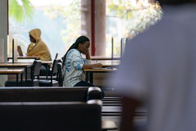 (260915) -- NAIROBI, Sept. 15, 2026 (Xinhua) -- Miriam Achieng Kenyatta (2nd L) studies at a library of the University of Nairobi in Nairobi, Kenya, Sept. 8, 2026. Miriam Achieng Kenyatta, a 23-year-old geospatial engineering student at the University of Nairobi, received a warm reception upon returning home after making history at the 25th "Chinese Bridge" Chinese Proficiency Competition for Foreign College Students.
  Raised in Nairobi's Kibera informal settlement, Achieng's life trajectory was transformed by a childhood curiosity sparked by a television movie. Her passion culminated in the highest-ever ranking by a Kenyan in the prestigious global contest, where she placed among the Top 15 worldwide.
  TO GO WITH "From Kibera to world top 15: Kenyan student makes history in Chinese competition" (Xinhua/Xie Jianfei)