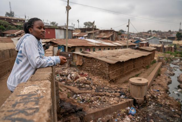 (260915) -- NAIROBI, Sept. 15, 2026 (Xinhua) -- Miriam Achieng Kenyatta looks at Kibera informal settlement in Nairobi, Kenya, Sept. 8, 2026. Miriam Achieng Kenyatta, a 23-year-old geospatial engineering student at the University of Nairobi, received a warm reception upon returning home after making history at the 25th "Chinese Bridge" Chinese Proficiency Competition for Foreign College Students.
  Raised in Nairobi's Kibera informal settlement, Achieng's life trajectory was transformed by a childhood curiosity sparked by a television movie. Her passion culminated in the highest-ever ranking by a Kenyan in the prestigious global contest, where she placed among the Top 15 worldwide.
  TO GO WITH "From Kibera to world top 15: Kenyan student makes history in Chinese competition" (Xinhua/Xie Jianfei)