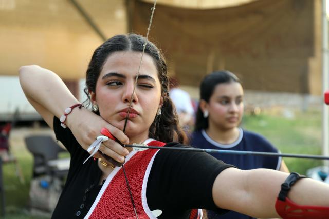 (260915) -- BAGHDAD, Sept. 15, 2026 (Xinhua) -- A woman practices archery at Al-Zawraa Park in Baghdad, Iraq, Sept. 14, 2026 (Xinhua/Khalil Dawood)