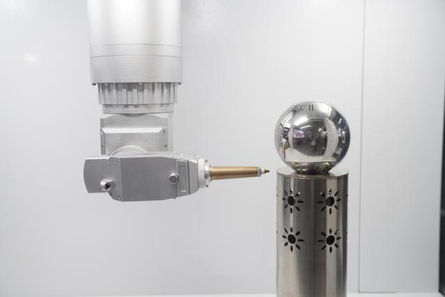 (260915) -- WUHAN, Sept. 15, 2026 (Xinhua) -- A three-dimensional laser head is pictured at a technology company in Wuhan, central China's Hubei Province, Sept. 14, 2026. Leveraging the advanced manufacturing cluster in the Wuhan Optics Valley, key technology companies in Wuhan have driven a coordinated development of more than 100 upstream and downstream enterprises. (Xinhua/Lu Jinbo)