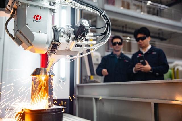 (260915) -- WUHAN, Sept. 15, 2026 (Xinhua) -- This undated file photo shows the six-axis laser micro-hole processing equipment for complex curved surfaces at a technology company in Wuhan, central China's Hubei Province. Leveraging the advanced manufacturing cluster in the Wuhan Optics Valley, key technology companies in Wuhan have driven a coordinated development of more than 100 upstream and downstream enterprises. (Xinhua)