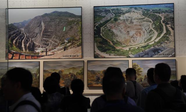 (260915) -- DAYE, Sept. 15, 2026 (Xinhua) -- People visit the museum of the heritage site of the ancient copper mine of Tonglyu mountain in Daye City of central China's Hubei Province, Sept. 15, 2026. The national archaeological site park of Tonglyu mountain is built on the heritage site of the ancient copper mine of Tonglyu mountain in Daye City of central China's Hubei Province. With the construction of the park as the leading project, local government has explored a characteristic path for protecting and developing cultural heritages, attracting lots of visitors. (Xinhua/Lu Jinbo)