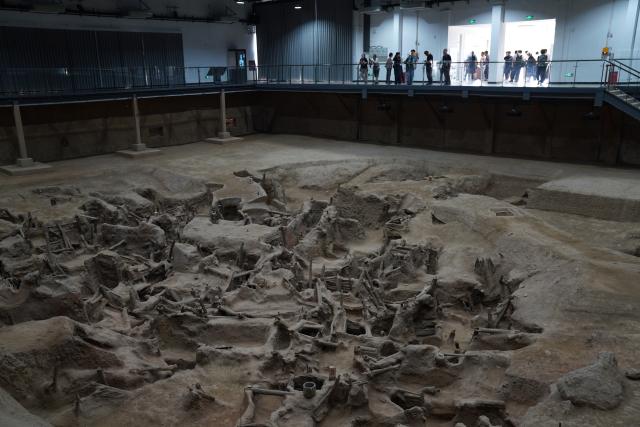 (260915) -- DAYE, Sept. 15, 2026 (Xinhua) -- People visit the heritage site of the ancient copper mine of Tonglyu mountain in Daye City of central China's Hubei Province, Sept. 15, 2026. The national archaeological site park of Tonglyu mountain is built on the heritage site of the ancient copper mine of Tonglyu mountain in Daye City of central China's Hubei Province. With the construction of the park as the leading project, local government has explored a characteristic path for protecting and developing cultural heritages, attracting lots of visitors. (Xinhua/Lu Jinbo)