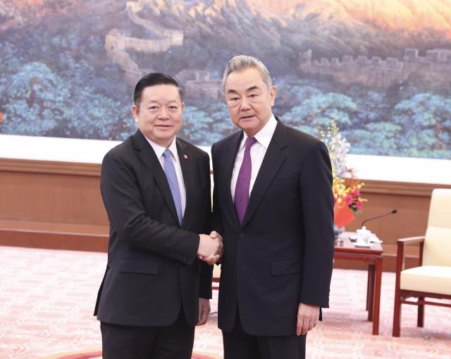 (260915) -- BEIJING, Sept. 15, 2026 (Xinhua) -- Chinese Foreign Minister Wang Yi, also a member of the Political Bureau of the Communist Party of China Central Committee, meets with Secretary-General of ASEAN Kao Kim Hourn in Beijing, capital of China, Sept. 15, 2026. (Xinhua/Pang Xinglei)