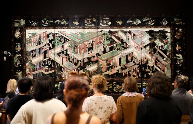 (260915) -- PARIS, Sept. 15, 2026 (Xinhua) -- Visitors view exhibits on display at Maison Guimet in Paris, France, Sept. 15, 2026. Maison Guimet is housed in the Hotel d'Heidelbach, a private mansion built in 1913. The mansion became part of the Guimet National Museum of Asian Arts in 1991 and reopened to the public as Maison Guimet in May, 2026 following renovation. (Xinhua/Wu Huiwo)