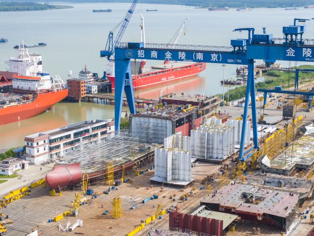 (260916) -- BEIJING, Sept. 16, 2026 (Xinhua) -- A drone photo shows workers building a vessel at a ship building factory in Nanjing, east China's Jiangsu Province, Sept. 15, 2026. China's economy maintained steady momentum boosted by innovation-led and high-quality development in August, with production and supply growing steadily, employment and prices generally stable, and foreign trade registering rapid growth, official data showed on Tuesday. (Photo by Shi Jun/Xinhua)