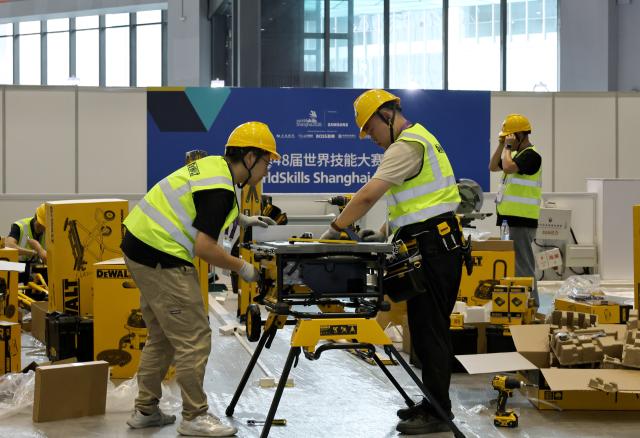 (260916) -- BEIJING, Sept. 16, 2026 (Xinhua) -- Technicians run tests at the venue for carpentry event of the 48th WorldSkills Competition, in east China's Shanghai, Sept. 15, 2026. The 48th WorldSkills Competition is scheduled to take place from September 22 to 27 in Shanghai. (Xinhua/Fang Zhe)