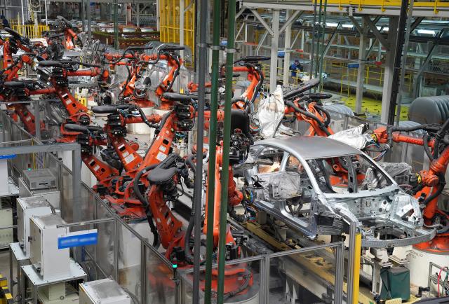 (260916) -- BEIJING, Sept. 16, 2026 (Xinhua) -- Robotic arms weld vehicle body components at the BYD Fuzhou base in Fuzhou, east China's Jiangxi Province, Sept. 9, 2026. In the workshop of Chinese automaker BYD's Fuzhou base in Jiangxi, stamping, welding, painting and final assembly processes operate efficiently. Industrial robots and automated guided vehicles work in coordination, achieving full-process digital control. (Xinhua/Wan Xiang)