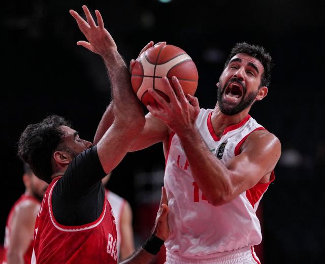 (260916) -- NAGOYA, Sept. 16, 2026 (Xinhua) -- Arsalan Kazemi (R) of Iran competes during the quarterfinal between Iran and Bahrain at 20th Asian Games Aichi-Nagoya 2026 in Nagoya, Japan, Sept. 16, 2026. (Xinhua/Luo Yuan)