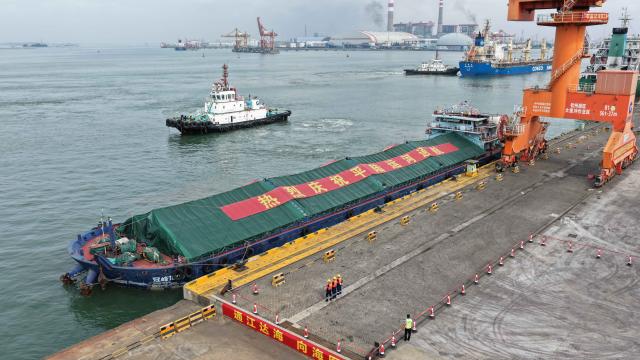 (260916) -- NANNING, Sept. 16, 2026 (Xinhua) -- A drone photo taken on Sept. 16, 2026 shows a cargo vessel preparing to depart for Nanning Port along the Pinglu Canal at the Qinzhou Port area of Beibu Gulf Port in Qinzhou, south China's Guangxi Zhuang Autonomous Region. (Xinhua/Zhang Ailin)