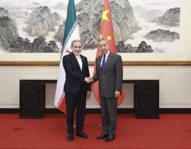 (260916) -- BEIJING, Sept. 16, 2026 (Xinhua) -- Chinese Foreign Minister Wang Yi, also a member of the Political Bureau of the Communist Party of China Central Committee, holds talks with Minister of Foreign Affairs of Iran Seyyed Abbas Araghchi in Beijing, capital of China, on Sept. 16, 2026. (Xinhua/Ding Haitao)