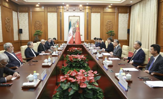 (260916) -- BEIJING, Sept. 16, 2026 (Xinhua) -- Chinese Foreign Minister Wang Yi, also a member of the Political Bureau of the Communist Party of China Central Committee, holds talks with Minister of Foreign Affairs of Iran Seyyed Abbas Araghchi in Beijing, capital of China, on Sept. 16, 2026. (Xinhua/Ding Haitao)