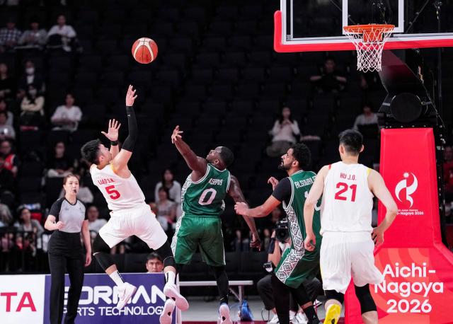 (260916) -- NAGOYA, Sept. 16, 2026 (Xinhua) -- Liao Sanning (1st L) of China shoots during the quarterfinal match between China and Saudi Arabia at 20th Asian Games Aichi-Nagoya 2026 in Nagoya, Japan, Sept. 16, 2026. (Xinhua/Luo Yuan)