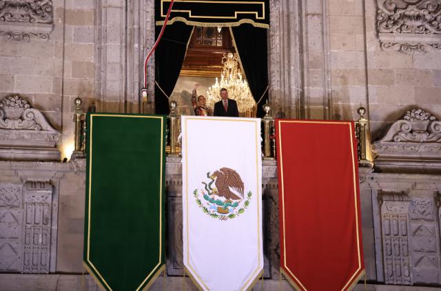 (260916) -- MEXICO CITY, Sept. 16, 2026 (Xinhua) -- Mexican President Claudia Sheinbaum (L) and her husband attend celebrations for the upcoming Independence Day in Mexico City, Mexico, Sept. 15, 2026. Various celebrations were held in Mexico to welcome the country's annual Independence Day, which falls on Sept. 16. (Xinhua/Liu Wenhui)