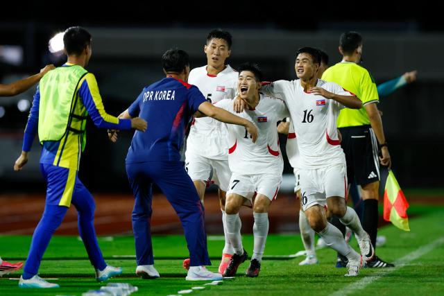 (260916) -- NAGOYA, Sept. 16, 2026 (Xinhua) -- Choe Kuk (4th L) of DPRK celebrates his goal during the group B match of men's football between China and the Democratic People's Republic of Korea (DPRK) at 20th Asian Games Aichi-Nagoya 2026 in Nagoya, Japan, Sept. 16, 2026. (Xinhua/Wu Zhizun)