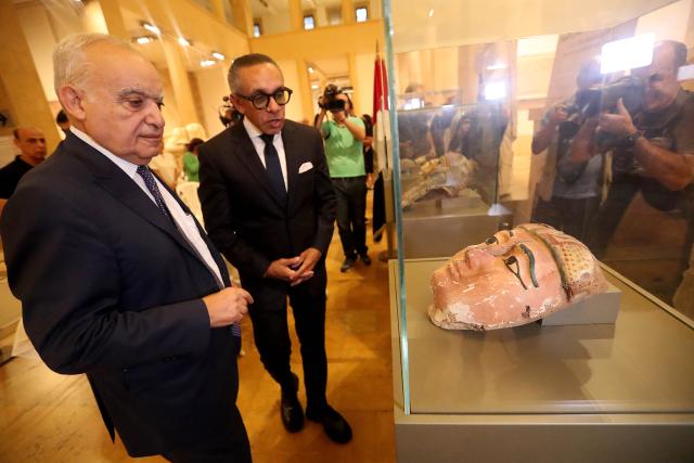 (260916) -- BEIRUT, Sept. 16, 2026 (Xinhua) -- Lebanese Culture Minister Ghassan Salameh (1st L) hands over the ancient Egyptian artifacts to Egyptian Ambassador to Lebanon Alaa Moussa (2nd L) at a ceremony at the National Museum in Beirut, Lebanon, on Sept. 16, 2026. Lebanon on Wednesday returned to Egypt 37 ancient artifacts that had been illegally smuggled into Lebanon, according to a statement by Lebanon's Culture Ministry. (Xinhua/Bilal Jawich)