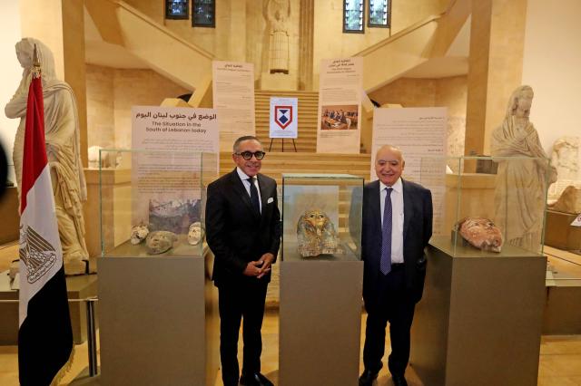 (260916) -- BEIRUT, Sept. 16, 2026 (Xinhua) -- Lebanese Culture Minister Ghassan Salameh (R) hands over the ancient Egyptian artifacts to Egyptian Ambassador to Lebanon Alaa Moussa at a ceremony at the National Museum in Beirut, Lebanon, on Sept. 16, 2026. Lebanon on Wednesday returned to Egypt 37 ancient artifacts that had been illegally smuggled into Lebanon, according to a statement by Lebanon's Culture Ministry. (Xinhua/Bilal Jawich)