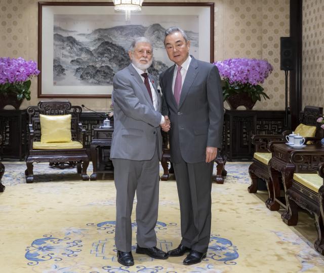 (260916) -- BEIJING, Sept. 16, 2026 (Xinhua) -- Wang Yi, a member of the Political Bureau of the Communist Party of China (CPC) Central Committee and director of the Office of the Foreign Affairs Commission of the CPC Central Committee, meets with Special Advisor to the President of Brazil Celso Amorim, in Beijing, capital of China, Sept. 16, 2026. (Xinhua/Zhai Jianlan)