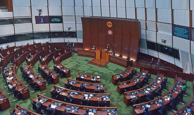 (260916) -- HONG KONG, Sept. 16, 2026 (Xinhua) -- John Lee, chief executive of the Hong Kong Special Administrative Region, unveils Hong Kong's first five-year plan for economic and social development (2026-2030) and delivers his fifth policy address in Hong Kong, south China, Sept. 16, 2026. (Xinhua/Chen Duo)
