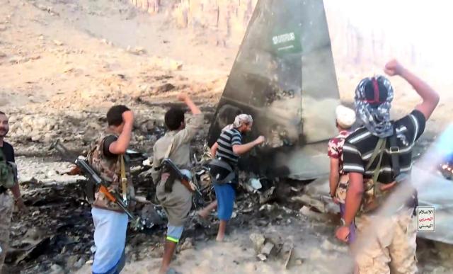 (260916) -- MARIB, Sept. 16, 2026 (Xinhua) -- This handout screenshot provided by Houthi Media Center shows Houthi fighters inspecting the downed Saudi fighter jet in Marib province, Yemen, Sept. 16, 2026. Yemen's Houthi group said Wednesday that it had shot down a Saudi F-15 fighter jet over the northeastern province of Marib, as hostilities between the two sides entered a new phase of intensified air operations and cross-border attacks. (Houthi Media Center/Handout via Xinhua)