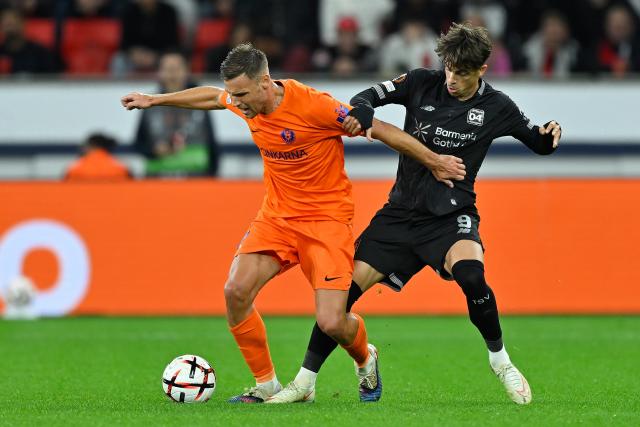 (260917) -- LEVERKUSEN, Sept. 17, 2026 (Xinhua) -- Afonso Moreira (R) of Bayer 04 Leverkusen vies with Pius Sirvys of NK Celje during the UEFA Europa League football match between Bayer 04 Leverkusen and NK Celje in Leverkusen, Germany, Sept. 16, 2026. (Photo by Ulrich Hufnagel/Xinhua)