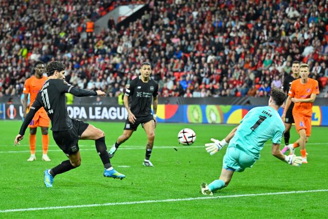 (260917) -- LEVERKUSEN, Sept. 17, 2026 (Xinhua) -- Martin Terrier (2nd L) of Bayer 04 Leverkusen shoots during the UEFA Europa League football match between Bayer 04 Leverkusen and NK Celje in Leverkusen, Germany, Sept. 16, 2026. (Photo by Ulrich Hufnagel/Xinhua)