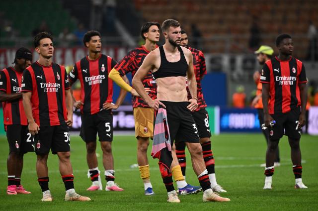 (260917) -- MILAN, Sept. 17, 2026 (Xinhua) -- AC Milan's players react after the UEFA Europa League match between AC Milan and Benfica in Milan, Italy, Sept. 16, 2026. (Photo by Alberto Lingria/Xinhua)