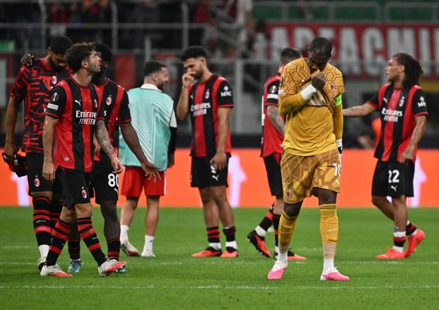 (260917) -- MILAN, Sept. 17, 2026 (Xinhua) -- AC Milan's players react after the UEFA Europa League match between AC Milan and Benfica in Milan, Italy, Sept. 16, 2026. (Photo by Alberto Lingria/Xinhua)