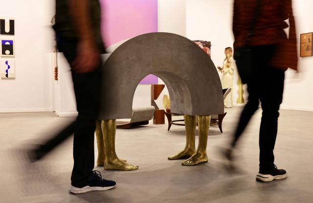 (260917) -- RIO DE JANEIRO, Sept. 17, 2026 (Xinhua) -- Visitors pass by an art installation during the ArtRio 2026 in Rio de Janeiro, Brazil, Sept. 16, 2026. The five-day fair kicked off here on Wednesday, showcasing contemporary artworks such as paintings, sculptures and art installations from around the world. (Xinhua/Jin Haoyuan)