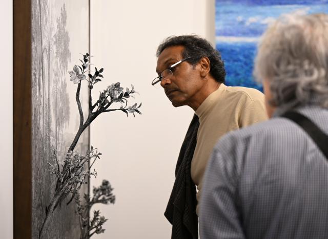 (260917) -- RIO DE JANEIRO, Sept. 17, 2026 (Xinhua) -- A visitor looks at an art installation during the ArtRio 2026 in Rio de Janeiro, Brazil, Sept. 16, 2026. The five-day fair kicked off here on Wednesday, showcasing contemporary artworks such as paintings, sculptures and art installations from around the world. (Xinhua/Jin Haoyuan)