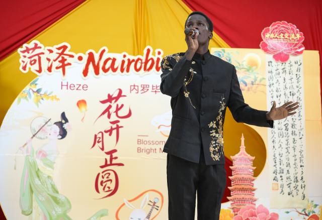 (260917) -- NAIROBI, Sept. 17, 2026 (Xinhua) -- A student sing a Chinese song during an event to celebrate the upcoming Mid-Autumn Festival at the Confucius Institute at Kenyatta University in Nairobi, Kenya, Sept. 16, 2026. TO GO WITH "Feature: Kenyan youth embrace China's Mid-Autumn Festival as cultural ties grow" (Xinhua/Yang Guang)