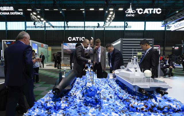 (260917) -- PRETORIA, Sept. 17, 2026 (Xinhua) -- People visit the booth of a Chinese exhibitor at the Africa Aerospace and Defense (AAD) expo in Pretoria, South Africa, Sept. 16, 2026. The 25th AAD expo kicked off at Air Force Base Waterkloof here on Wednesday, and the event will run until Sept. 20. (Xinhua/Chen Wei)